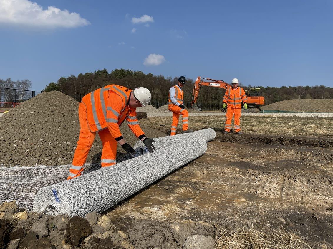 Tensar’s InterAx geogrid being rolled